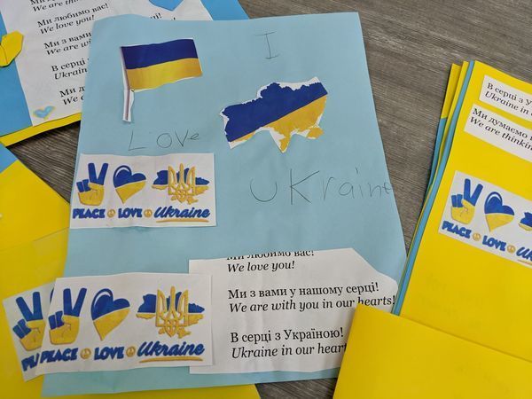 yellow and blue letters with ukraine stickers from students to ukraine